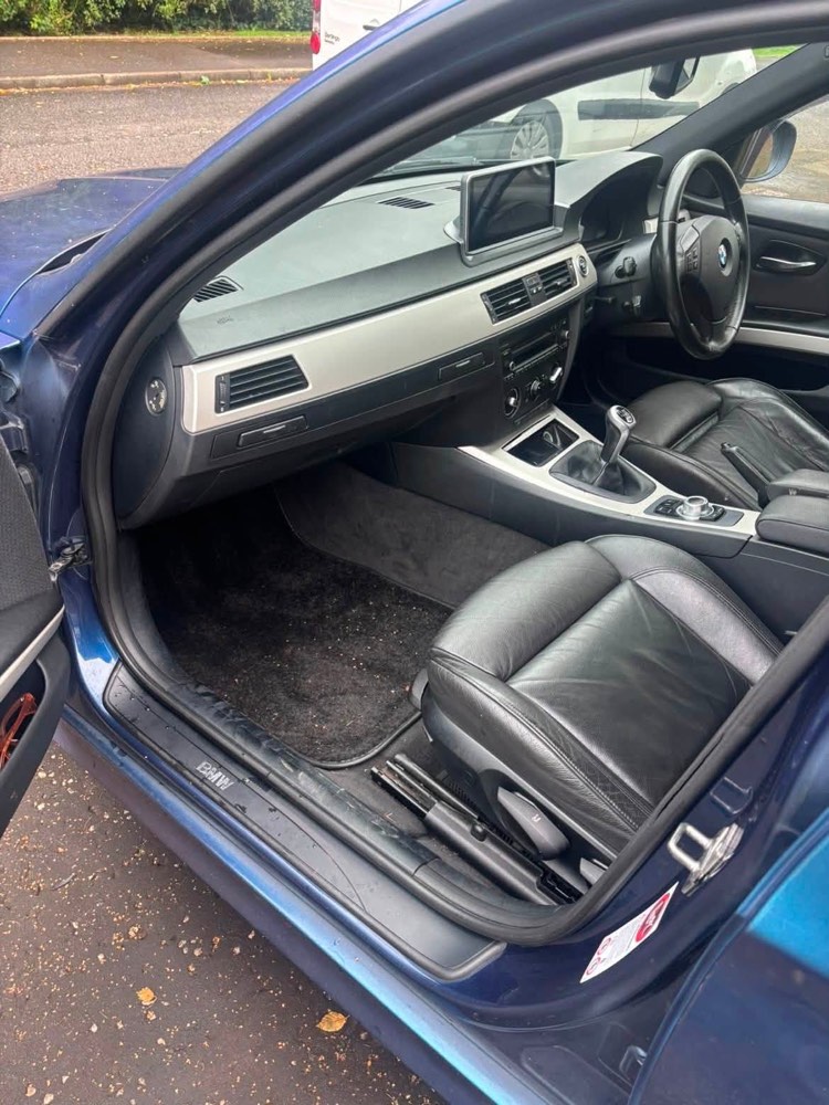 The same car interior before detailing